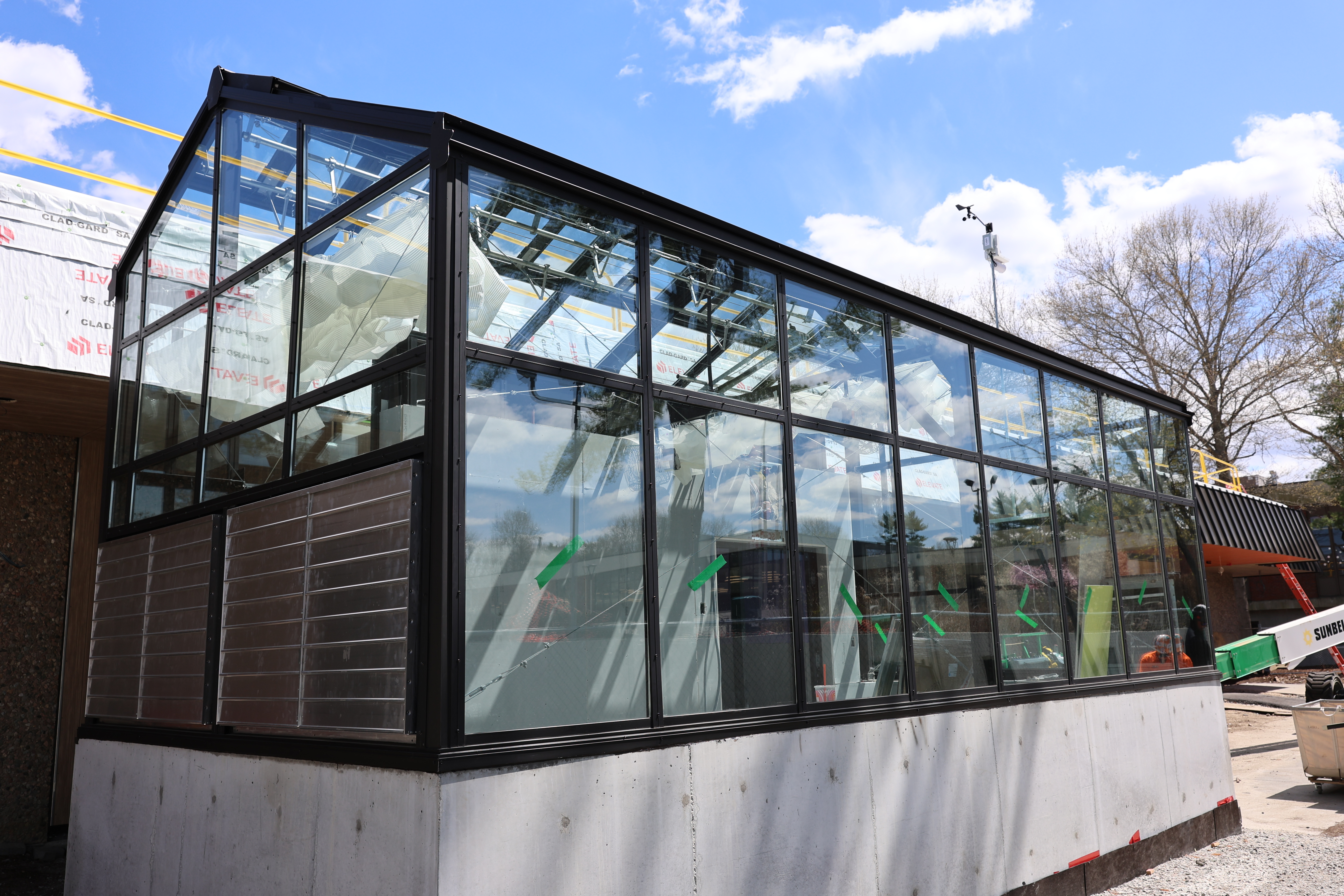 Greenhouse framing and glass work.