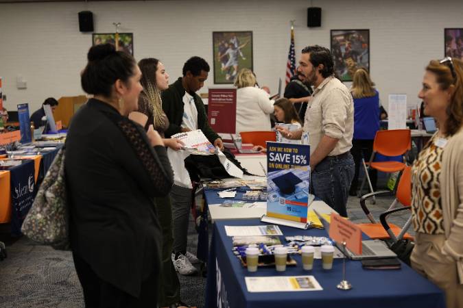 Students meeting with representatives at a Transfer Fair.