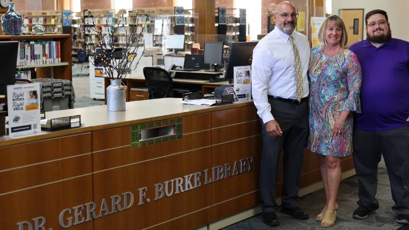 Members of the Burke Family in the Dr. Gerard F. Burke Library at Massasoit's Brockton Campus.