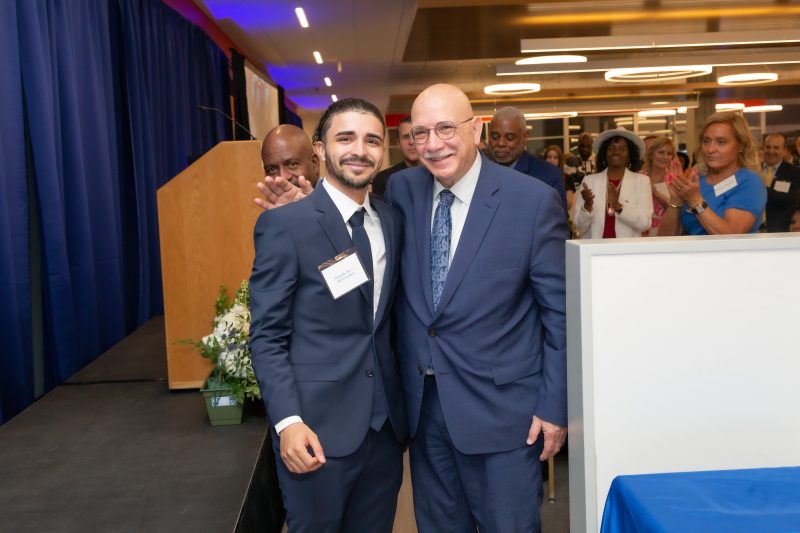 Massasoit Community College President Ray DiPasquale with Marvelous Marvin Hagler Scholarship recipient Orlando Alves at the 2023 Evening of Champions Fundraiser.