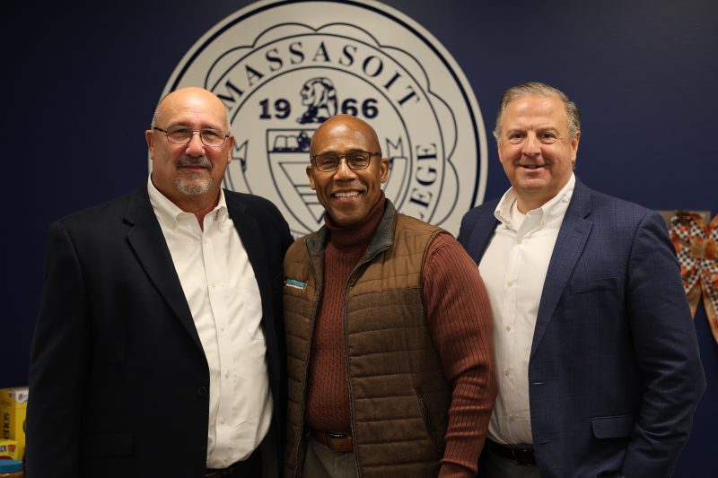 Photo of Massasoit President and Chair of Board of Trustees with new member.
